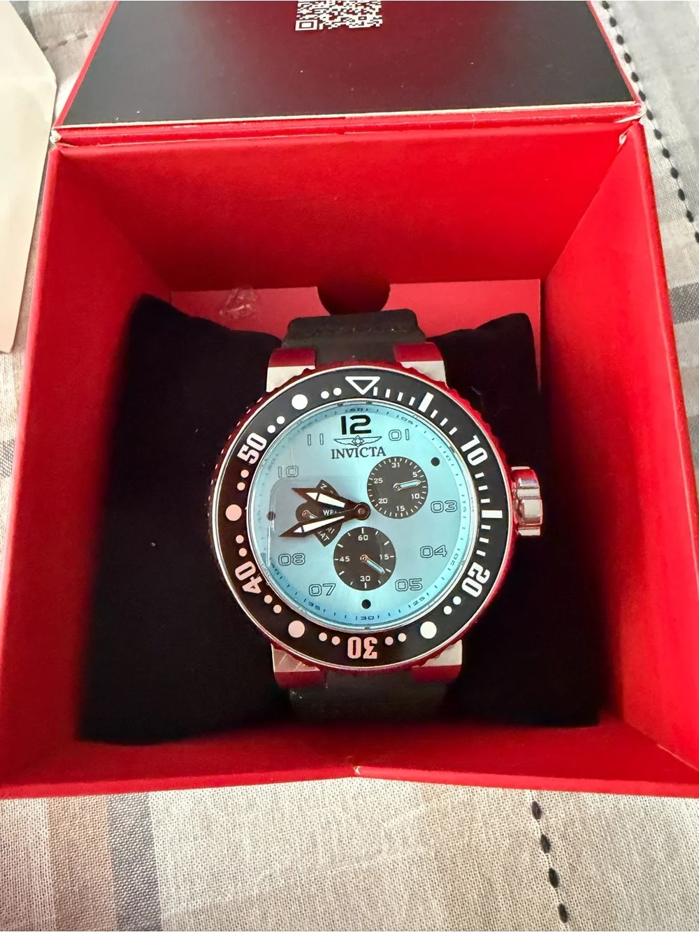 Invicta Men’s Light Blue Dial Black Bezel Chronograph Watch